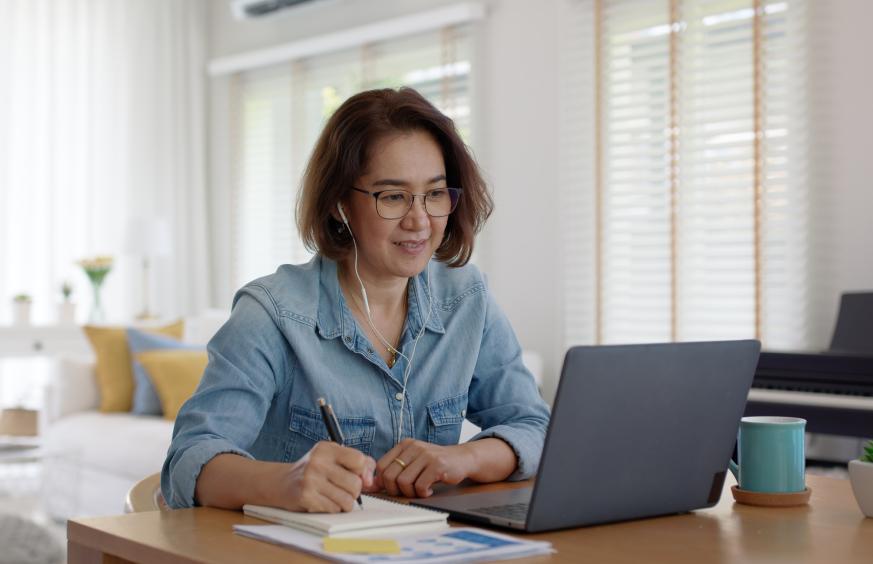 SFP Remote woman at desk computer education